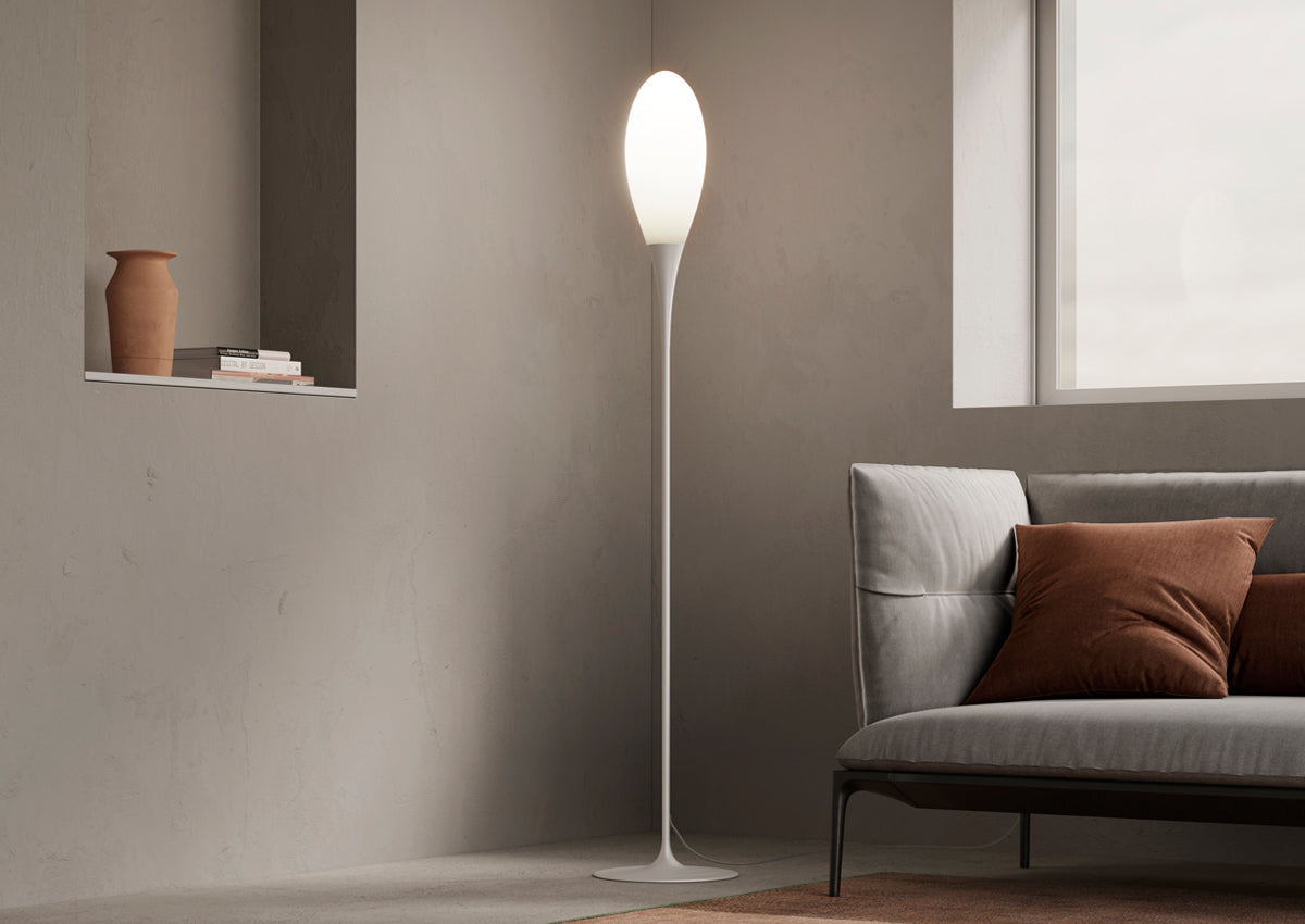 KDLN Spillo Floor lighting fixture with sleek modern design, standing tall with a slim metal rod and a round light head.