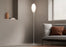 KDLN Spillo Floor lighting fixture with sleek modern design, standing tall with a slim metal rod and a round light head.
