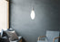 KDLN Spillo Suspension lighting fixture with sleek, modern design and adjustable hanging cords.