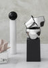 Skultuna Kin accessories displayed with sleek, modern design and metallic finishes on a white background.