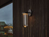 Outdoor In Vitro Wall lighting by Flos, modern wall-mounted fixture with sleek design and diffused LED light.