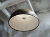 Matte black Skygarden LED ceiling light by Flos, featuring modern, sculptural design with integrated lighting elements.