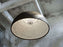 Matte black Skygarden LED ceiling light by Flos, featuring modern, sculptural design with integrated lighting elements.