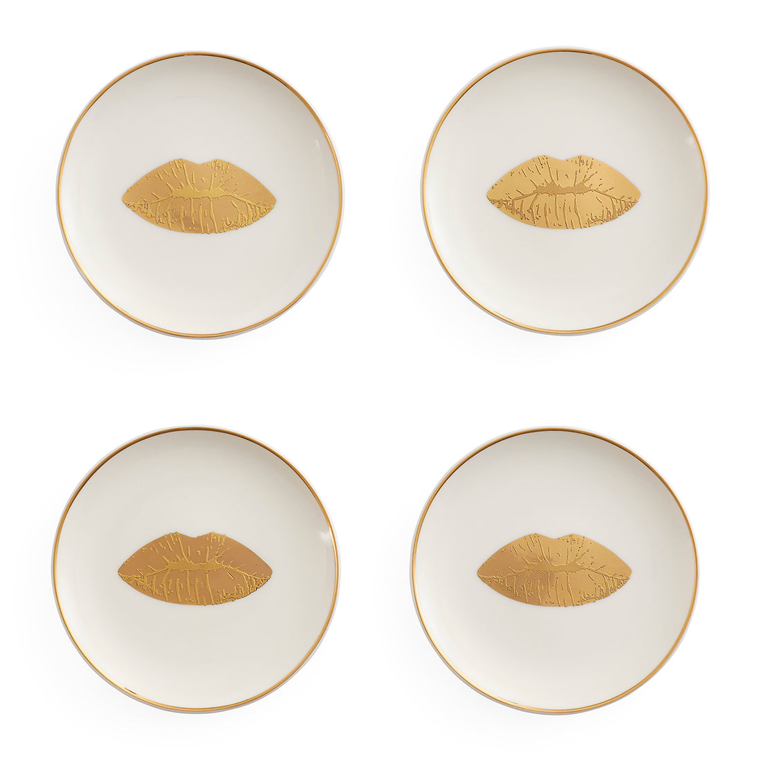 Set of four Lips Coasters by Jonathan Adler featuring bold lip print designs, stylish accessories for protecting tabletops.
