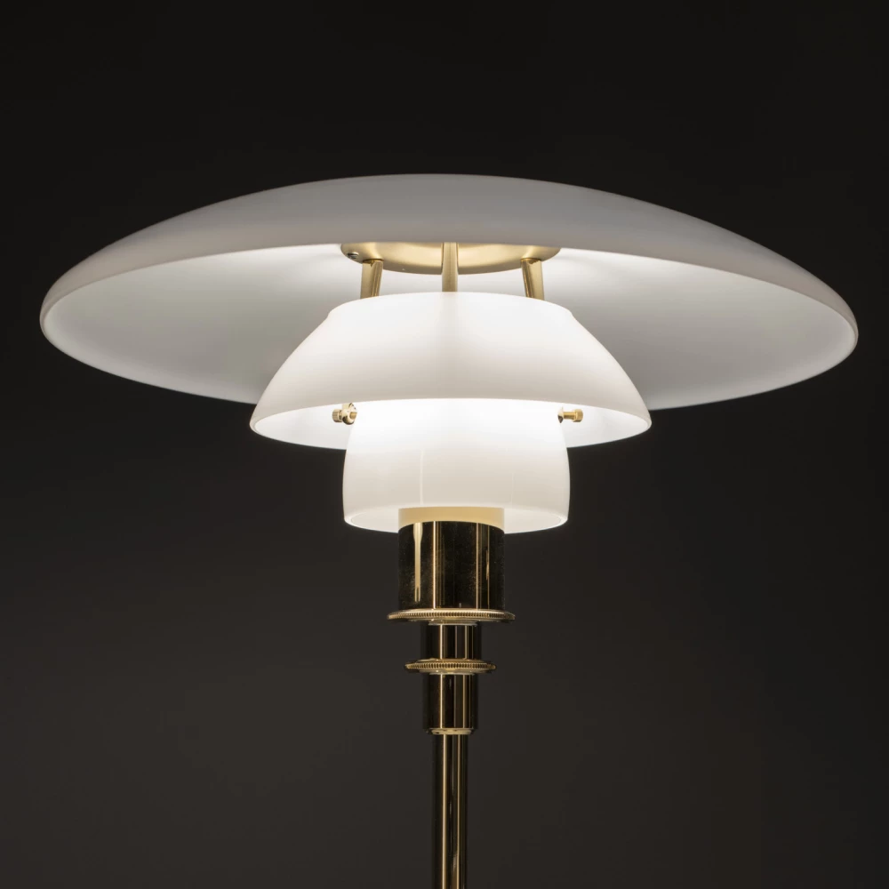 Louis Poulsen PH 3/2 glass table lamp with black metalized finish, featuring a distinctive sculptural lighting design.