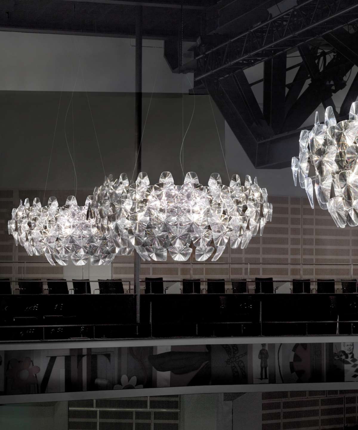 Hope Suspension Lamp by Luceplan hanging with sleek, modern design and illuminated glass shade for contemporary lighting.