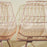 Lucy Chair by Bend Goods, modern metal seating with a woven design, shown in a close-up of the stylish, contemporary chair.