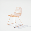 Lucy Chair by Bend Goods, stylish modern seating with a curved metal frame and woven seat, ideal for contemporary interiors.