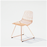 Lucy Chair by Bend Goods, stylish modern seating with a curved metal frame and woven seat, ideal for contemporary interiors.