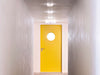 Mini Button by Flos, modern polycarbonate wall and ceiling light designed by Lissoni, showcasing a sleek, minimalist lighting fixture.