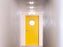 Mini Button by Flos, modern polycarbonate wall and ceiling light designed by Lissoni, showcasing a sleek, minimalist lighting fixture.