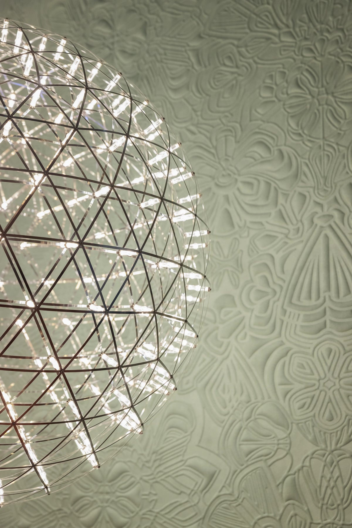 Elegant Raimond II Moooi lighting fixture with multiple glass orbs and sleek metal frame, modern design for stylish interiors.