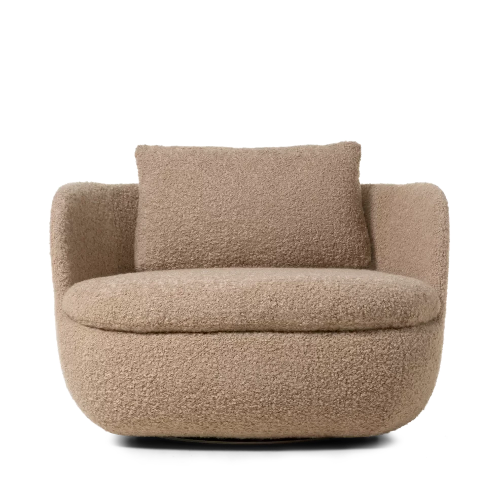 Modern Bart armchair by Moooi featuring a sleek design with plush upholstery and wooden legs, ideal for stylish seating.