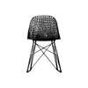 Modern Carbon Chair by Moooi featuring sleek black seating and minimalist design for stylish interior decor.