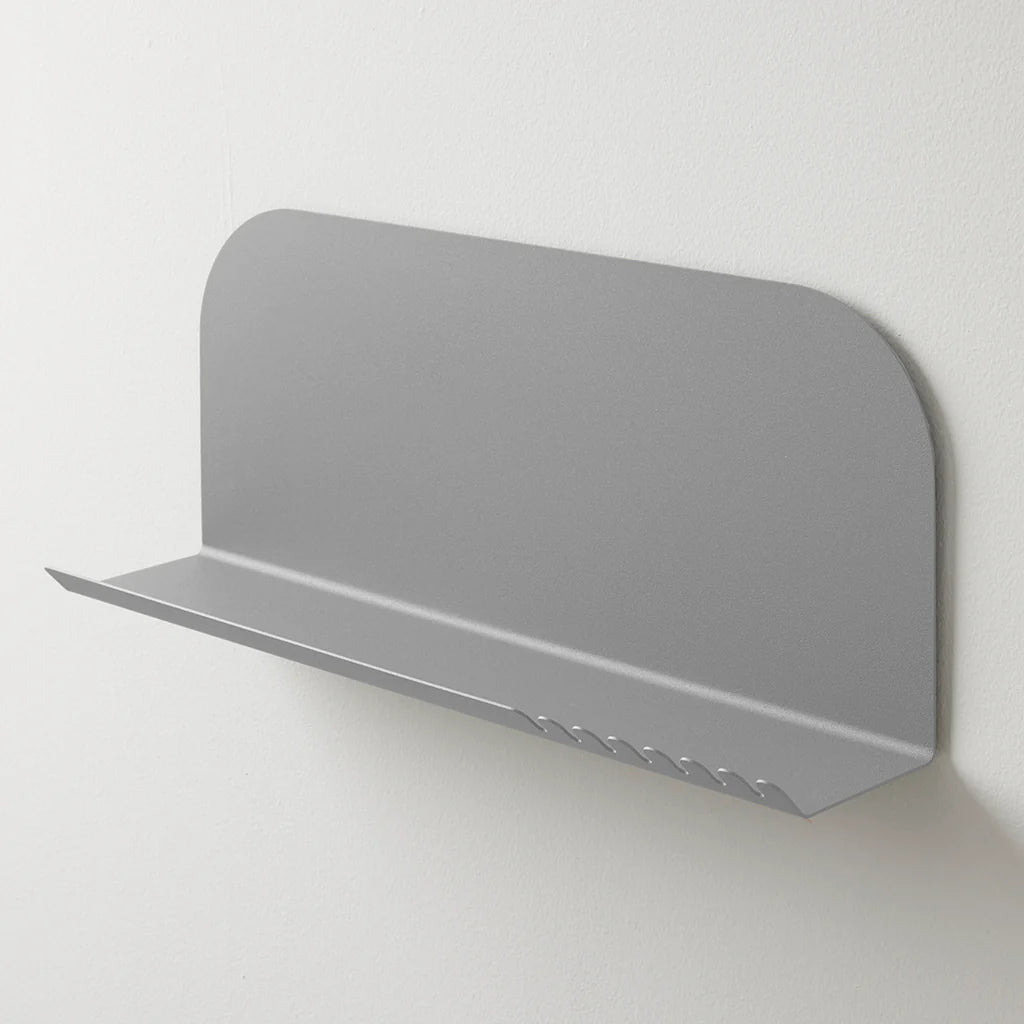 Most Modest Walter Wall Shelf made of linen, designed for stylish storage on the wall, showcasing its sleek, modern design.