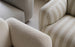 Swell sofa and armchair by Normann Copenhagen featuring modern seating with plush cushions and sleek design.