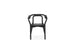 Black Knot seating by Normann Copenhagen, a modern sculptural chair with smooth curves and a natural finish.