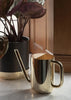 Skultuna Nurture Watering Can, silver metal accessory with a sleek design for garden watering and plant care.