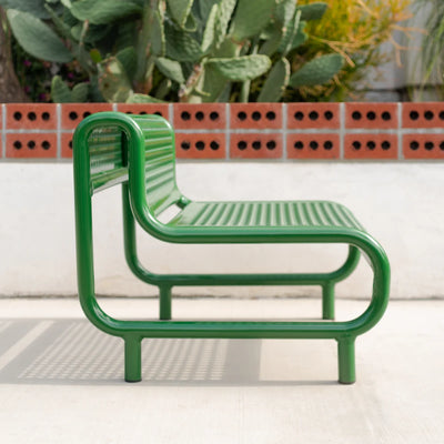 Outdoor Tube Lounge by Bend Goods, stylish seating with a tubular metal frame and cushioned top, ideal for outdoor relaxation.