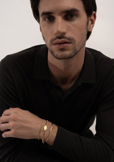 Gold plated Petit Paul Chain Bracelet by Skultuna, showcasing its delicate chain design and elegant jewelry style.
