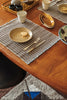Checker placemat by Lorena Canals in coffee bean, set of 2, featuring a classic checked pattern