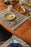 Checker placemat by Lorena Canals in coffee bean, set of 2, featuring a classic checked pattern