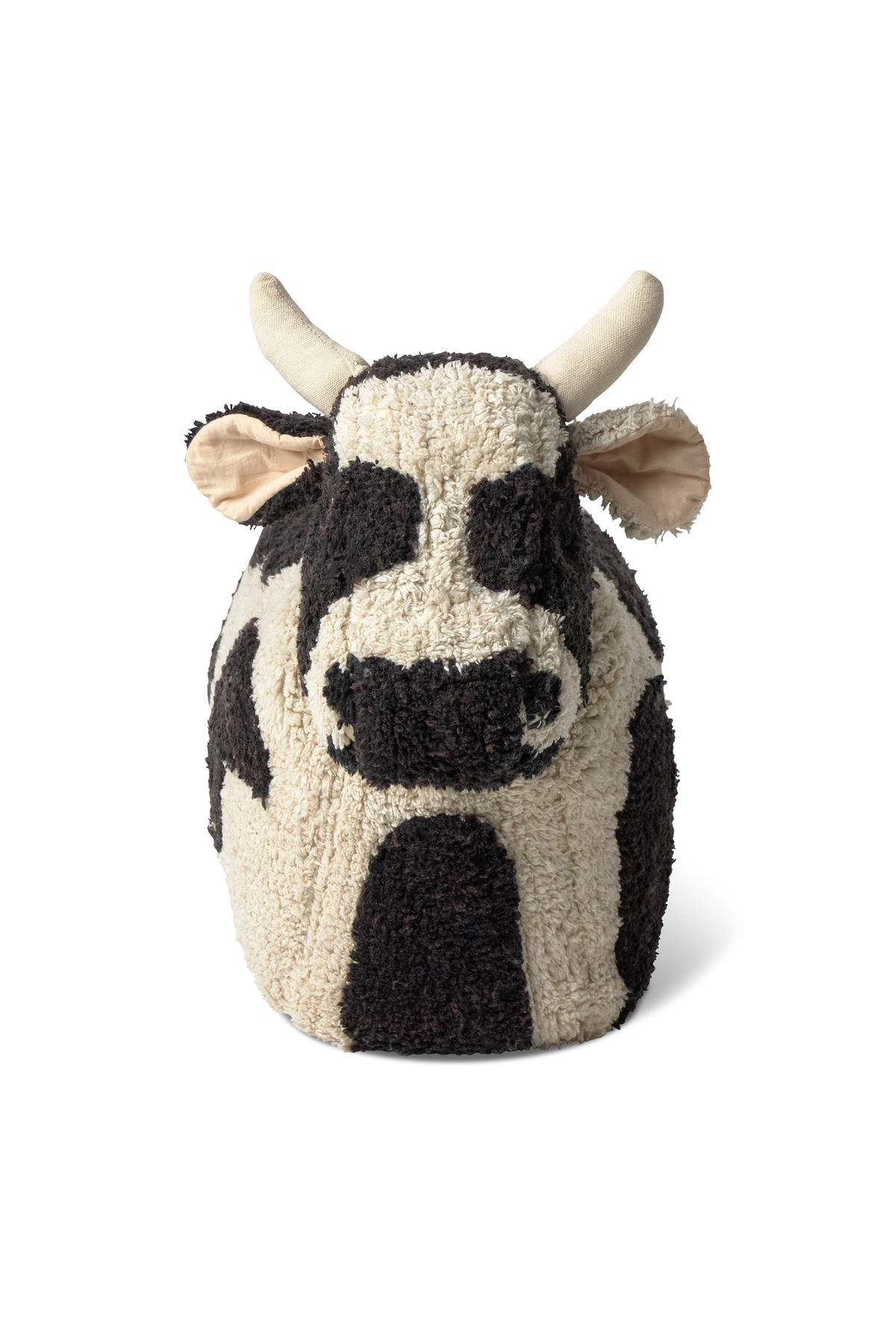 Kids' Lola the Cow pouf by Lorena Canals featuring a soft, plush cow design perfect for children's room decor.