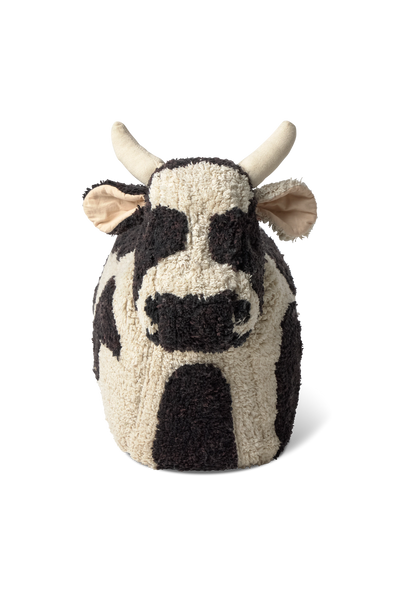 Kids' Lola the Cow pouf by Lorena Canals featuring a soft, plush cow design perfect for children's room decor.