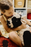 Kids' Lola the Cow pouf by Lorena Canals featuring a soft, plush cow design with black and white spots, perfect for children's room decor.
