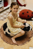 Kids' Lola the Cow Pouf by Lorena Canals, soft plush with cow print design, perfect for children's room decor and seating.