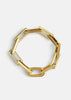 Gold plated Relier Petit bracelet by Skultuna, featuring a delicate chain design, worn on a wrist with a minimalist aesthetic.