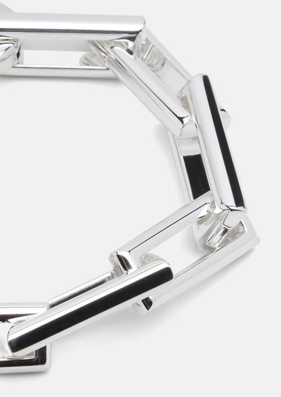 Silver plated Relier Petit bracelet by Skultuna, featuring a delicate and minimalist design, shown on a neutral background.