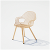 Tan Rita Chair by Bend Goods, stylish modern seating with curved armrests and sleek design, perfect for contemporary interiors.