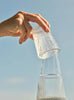 Carafe Pilastro avec verre 1 L, par Stelton