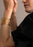 Skultuna Dew Cuff accessory featuring sleek, modern design with textured metal finish, displayed on a neutral background.