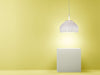 White Tatou Suspension lighting by Flos hanging from ceiling with a modern, sculptural design by Urquiola.