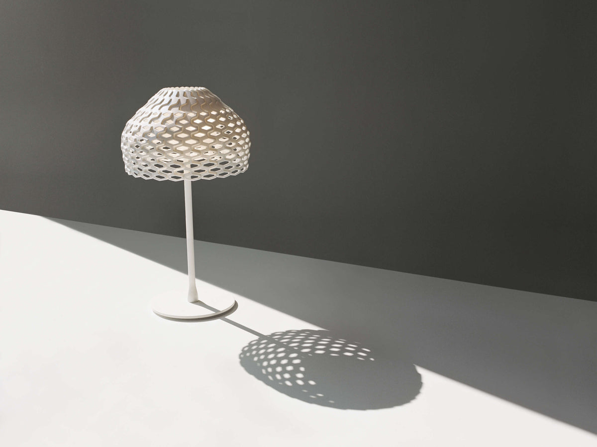Tatou Table by Flos, modern white lighting fixture designed by Urquiola, showcasing sleek, minimalist table lamp with a smooth finish.