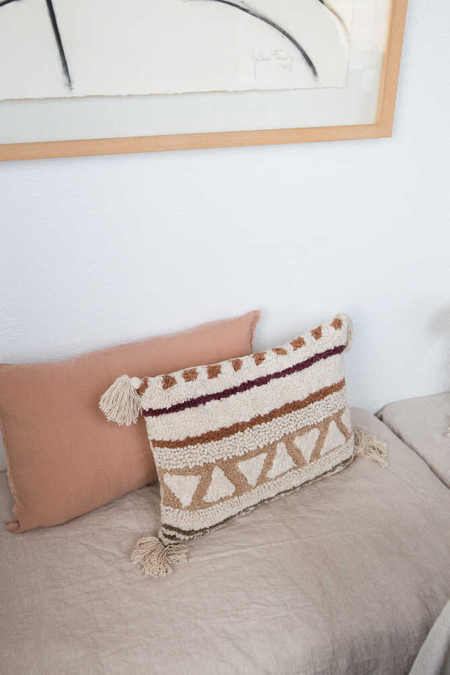 Rectangular Sistan throw pillow by Lorena Canals featuring a vibrant, patterned fabric ideal for home accessories.