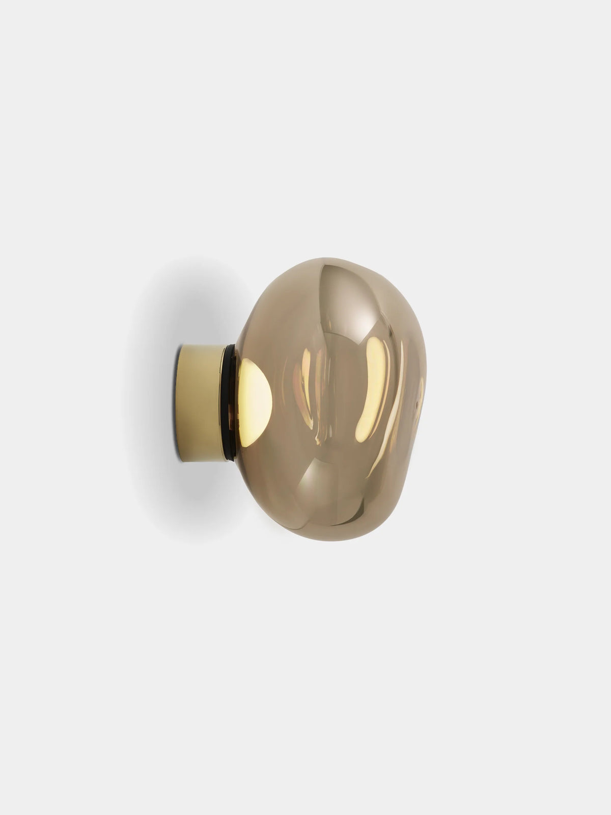 Silver Melt Mini Surface Light by Tom Dixon, modern lighting fixture with sleek metallic finish and minimalist design.