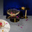 Tom Dixon Flash Square Table with black polished steel frame and mirrored glass surface, modern design for contemporary interiors.