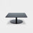 Black polished steel Flash Square Table by Tom Dixon featuring mirrored glass surface, modern design, and sleek geometric shape.