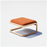Tan Bend Goods Tube Ottoman, modern seating piece with sleek cylindrical design and plush upholstery.