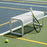 Bend Goods Tube Bench seating with sleek metal frame and woven seat, ideal for modern indoor or outdoor spaces.