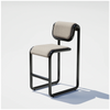 Black Tube Counter Stool by Bend Goods, featuring a sleek seating design with a boucle upholstered seat and modern metal frame.