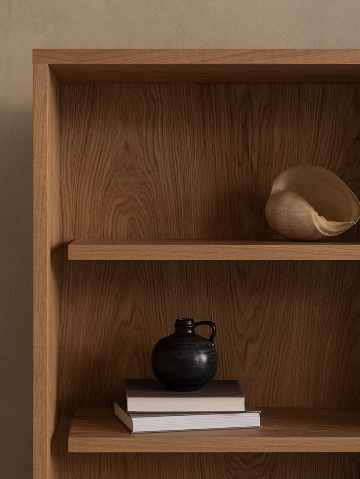 Un'common BLOCK storage cabinet made of wood with multiple open shelves for organization and display.
