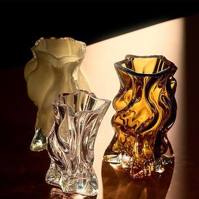 Small Vena Vase by AYTM in amber glass, showcasing its elegant, modern design for decorative accessories.