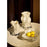 Dark cream Vena Vase by AYTM, modern ceramic accessory with a sleek, curved design, perfect for stylish home décor.