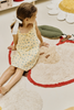 Kids' washable Apple rug by Lorena Canals featuring a vibrant apple design, soft fabric, and playful style.