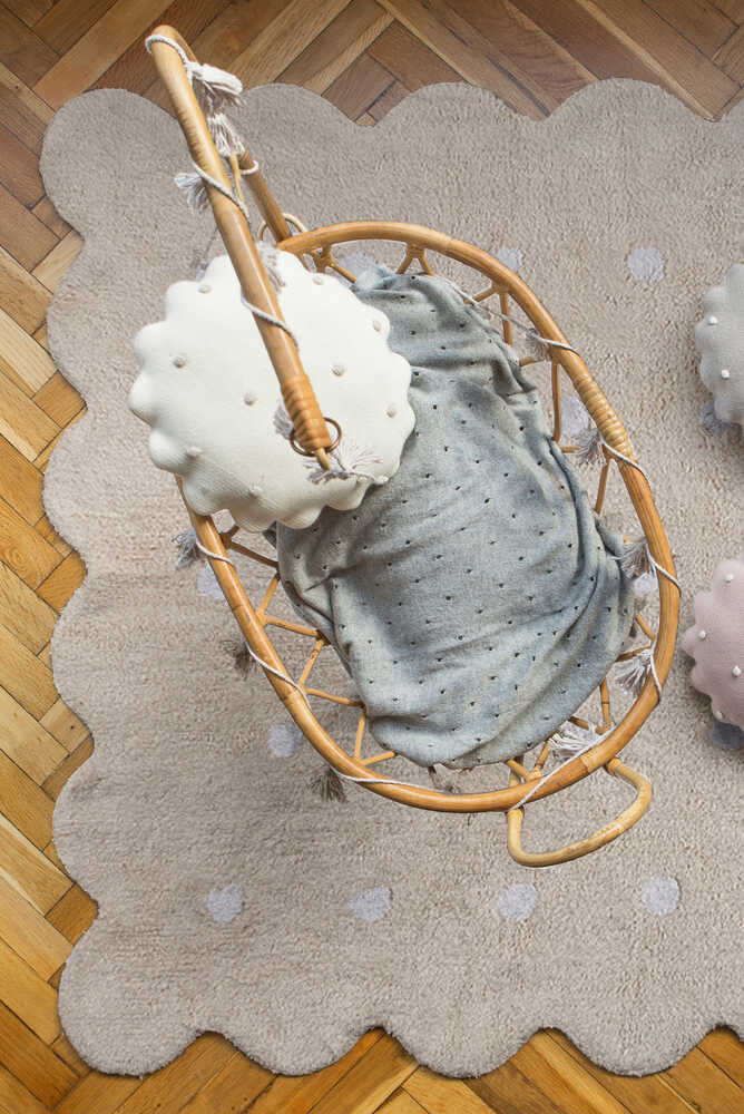 Beige washable rug named Biscuit by Lorena Canals, shown as a soft, plush accessory with a textured surface.