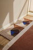 Tessera Small Wool Rug by Lorena Canals in brown with a textured geometric design